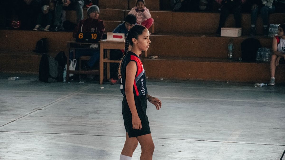 Iranian women's futsal team in action, showcasing their skill and determination.
