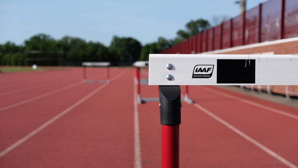 A gloved hand carefully seals a doping sample in a sterile sports lab during the Iman Mohammadi doping case.