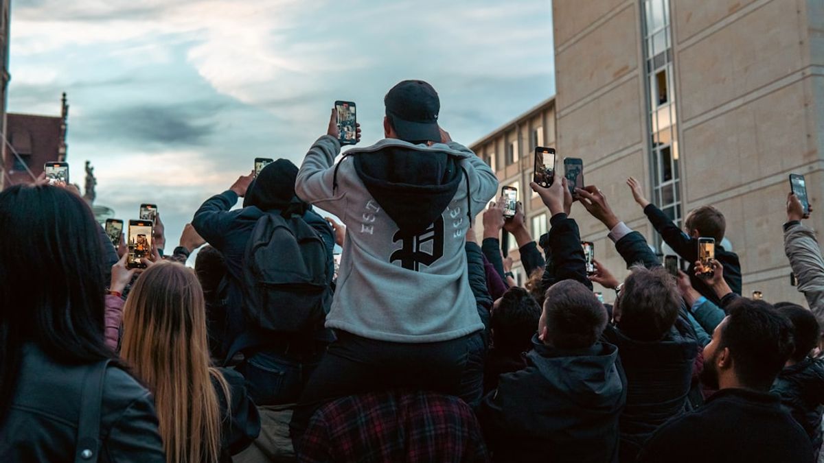 Fans engage with augmented reality displays at a rugby league community event, demonstrating innovative sport sponsorship updates