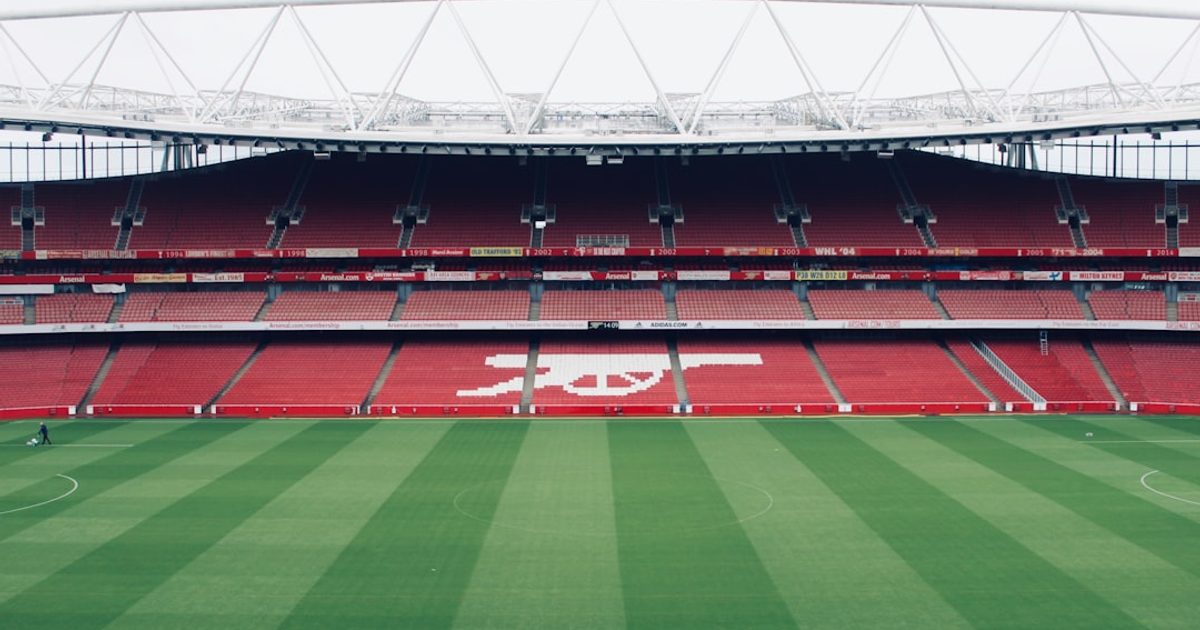 Premier League title race football match at a packed stadium