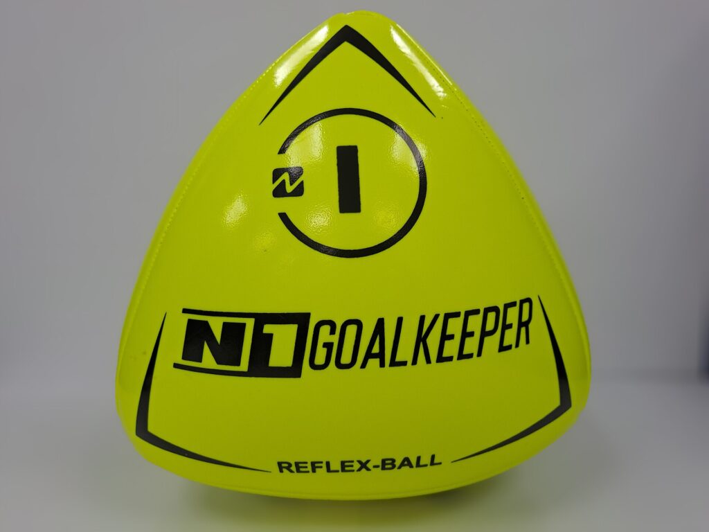 A goalkeeper throwing the ball out to a teammate to start an attack