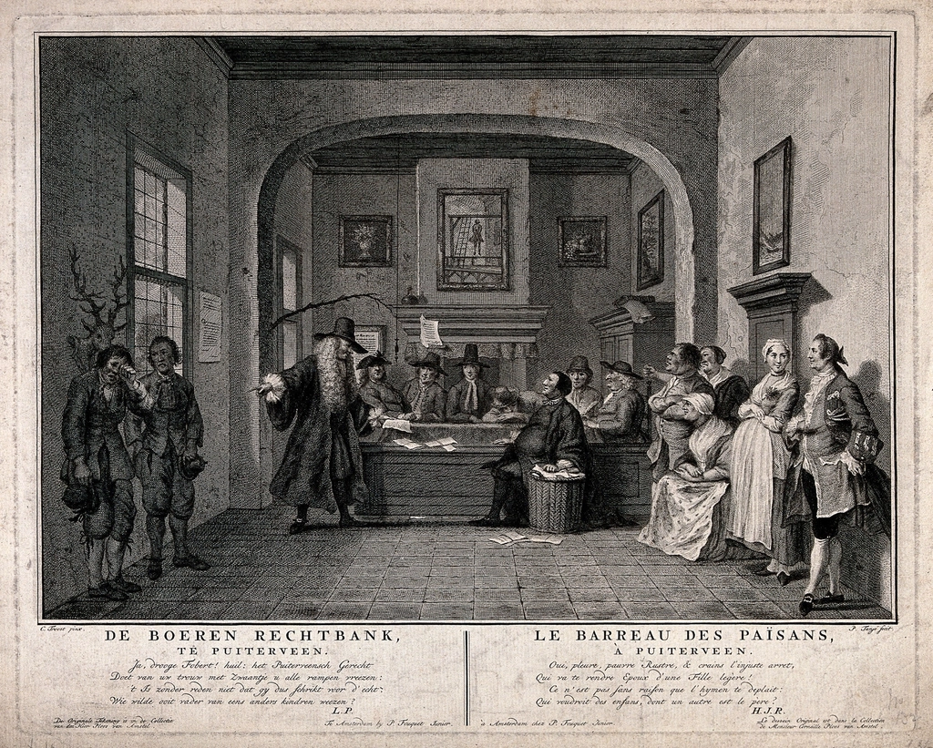 An empty hearing room with a long table and chairs arranged for a formal review
